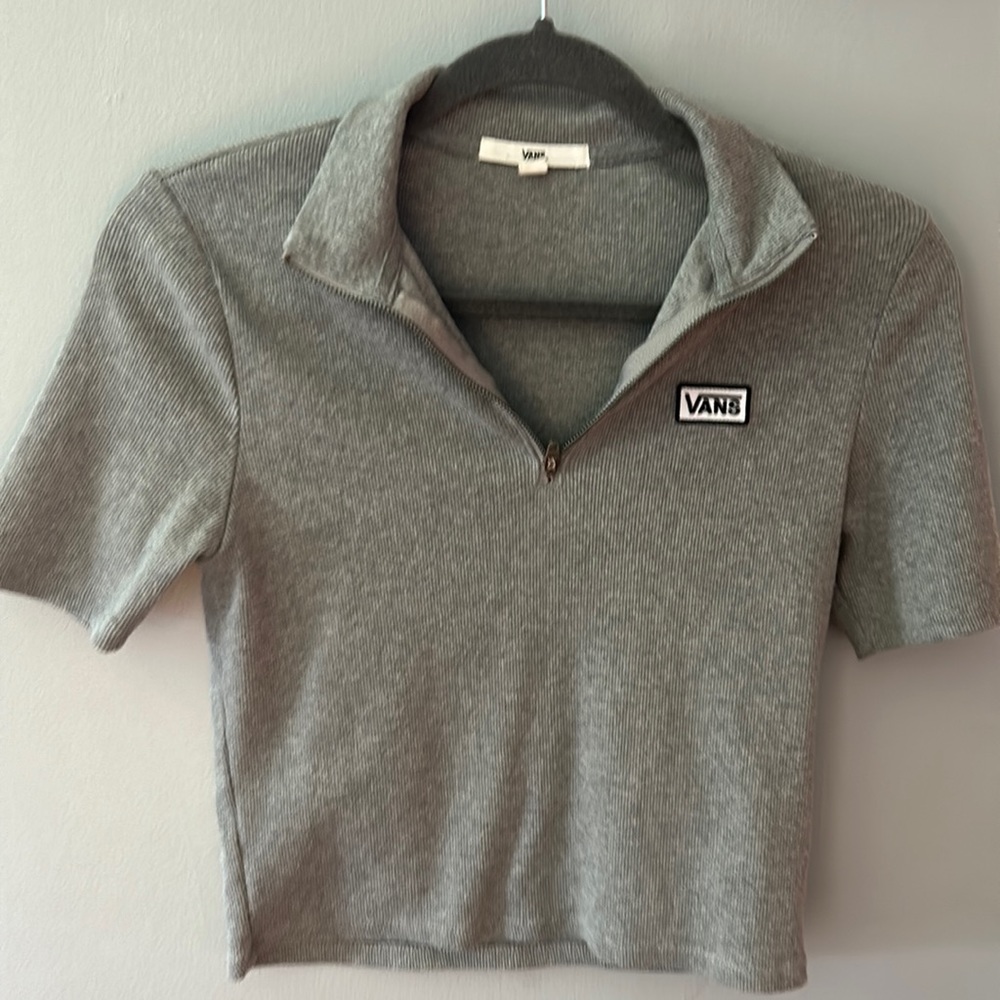 Vans short sleeved crop top shirt size Medium gray with a front zipper.